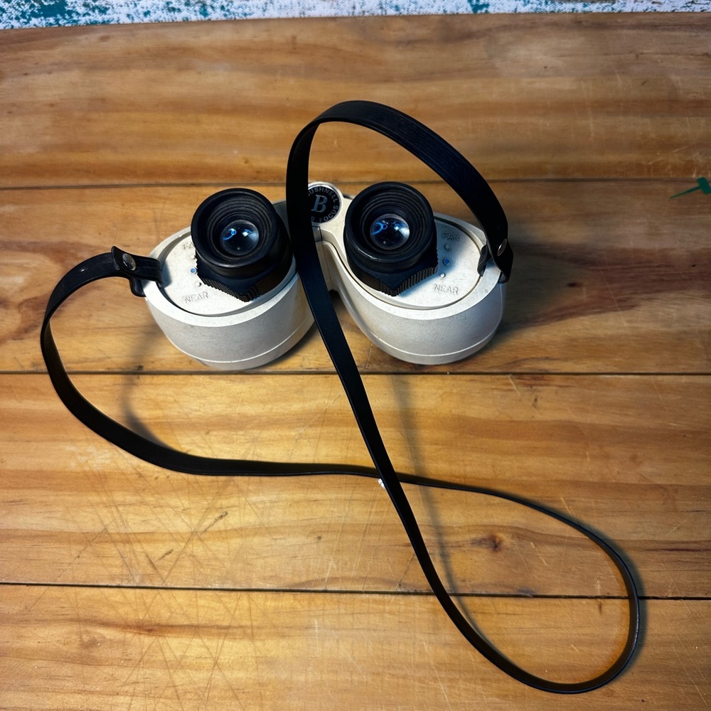 Vintage 1970s Bushnell expo extra power thumb focus binoculars